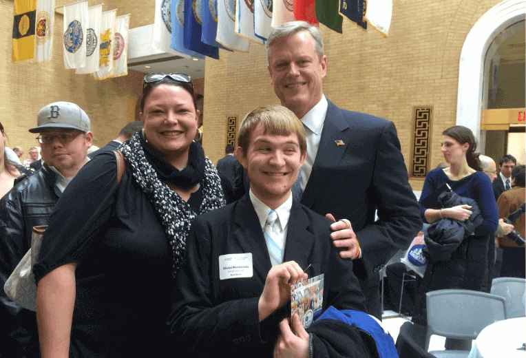 jri-staff-and-artist-with-governor-baker